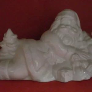 Liggjandi jólasveinn fyrir ljós