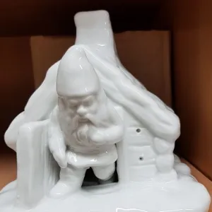 Jólasveinn að fara úr húsi fyrir ljós